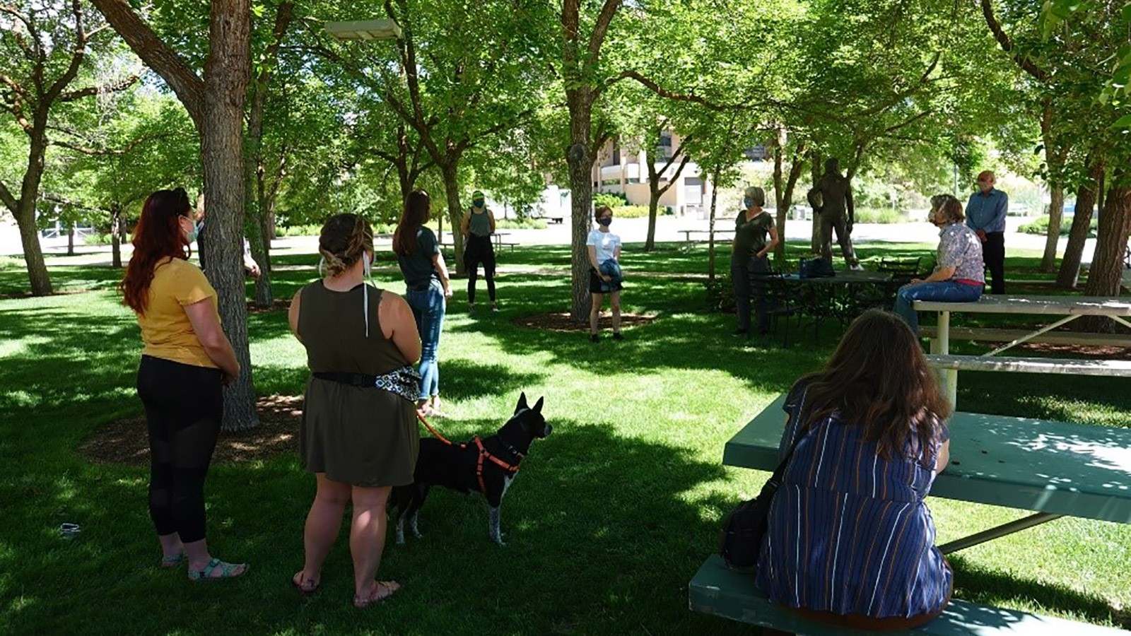 QCNR students and faculty gather near the Janet Quinney statue.