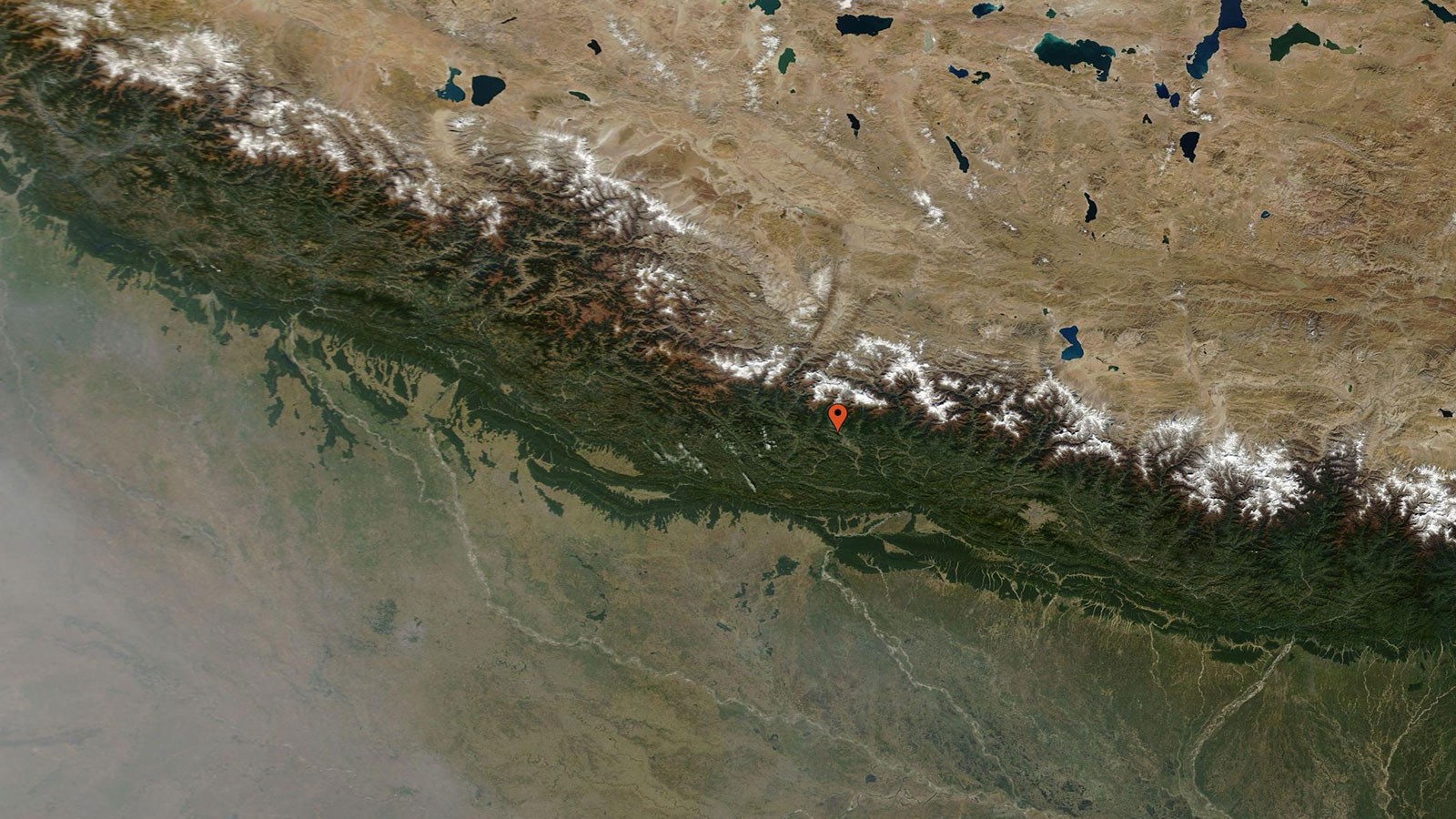 A satellite view of Nepal taken on Oct. 30, 2020, shows less air pollution than the Nov. 7 image.