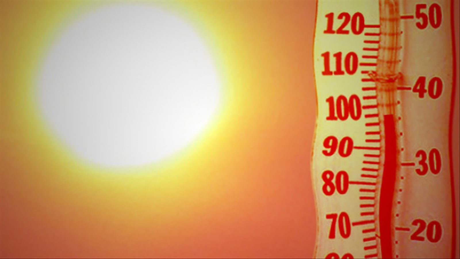 The temperature on a thermometer approaches 100 degrees Fahrenheit in this stock photo illustration.