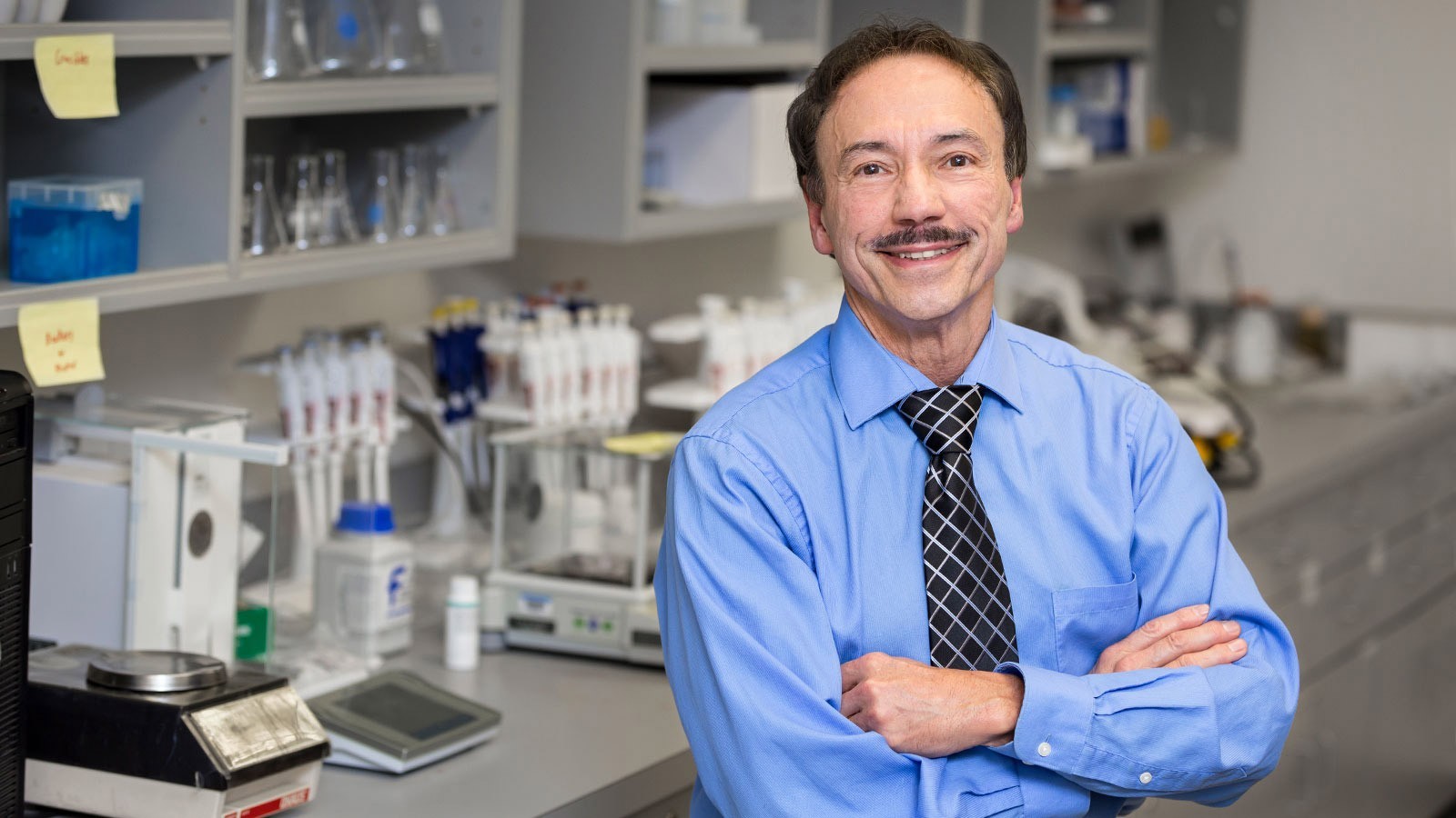 Ron Sims poses for a photo in an engineering lab at Utah State Unversity
