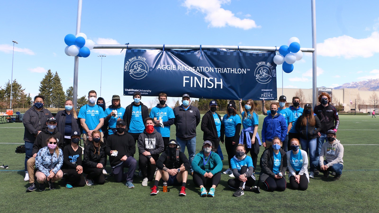 USU Triathlon participants gather at the finish line.