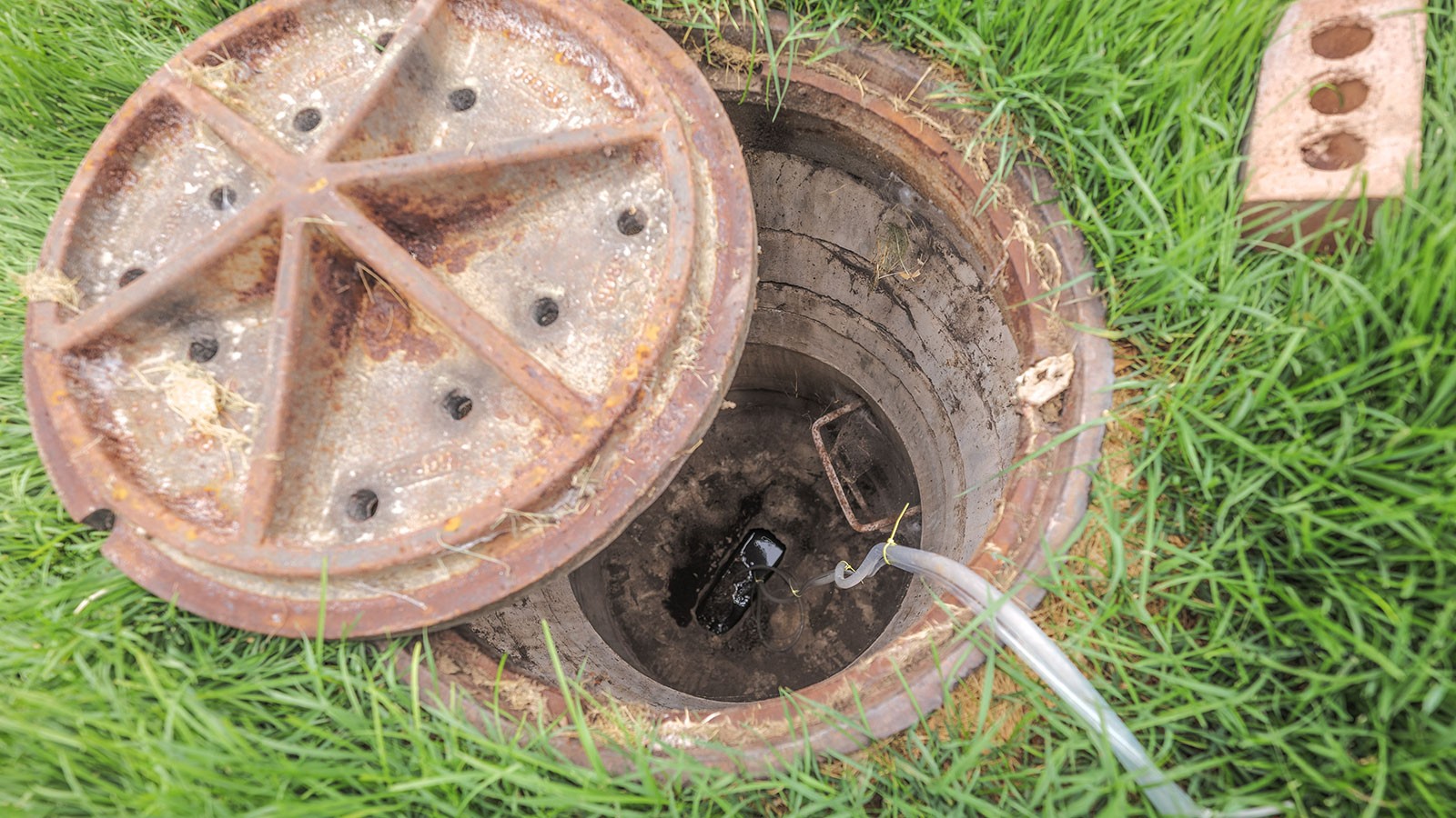 sewer hole outside apartments and dorms