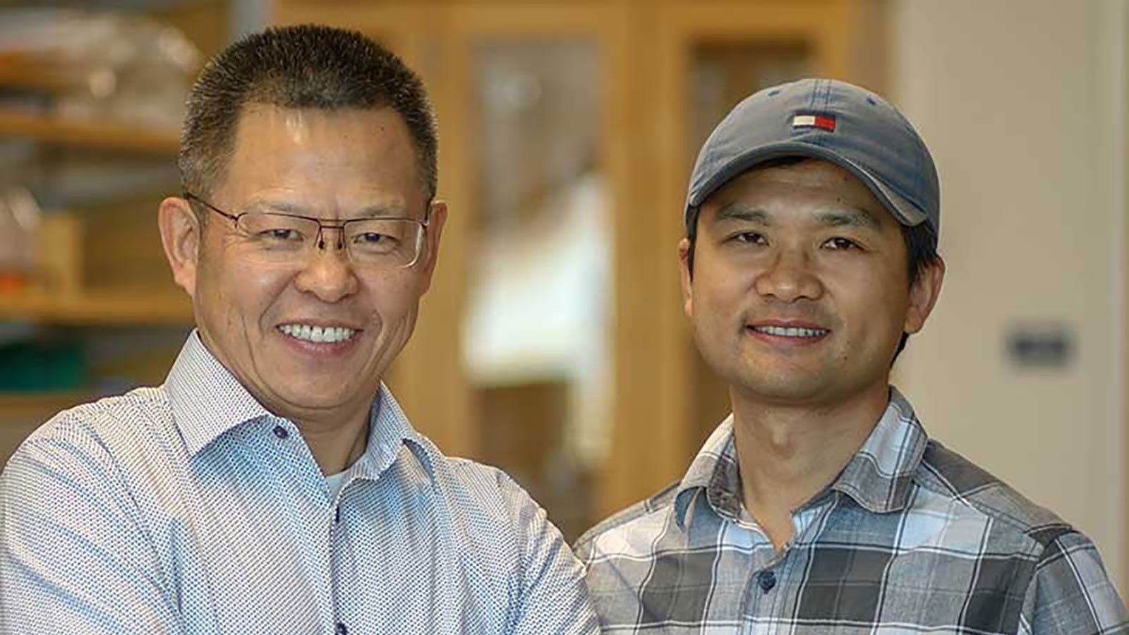Animal science Professor Zhongde Wang and Post-doctoral Fellow Rong Li in the Wang lab.