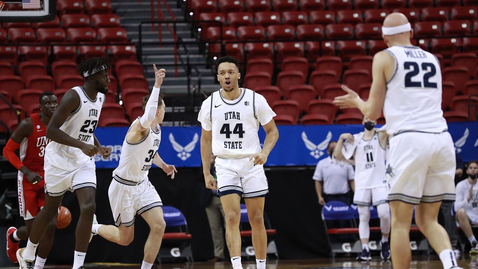 USU men's basketball team on the court.