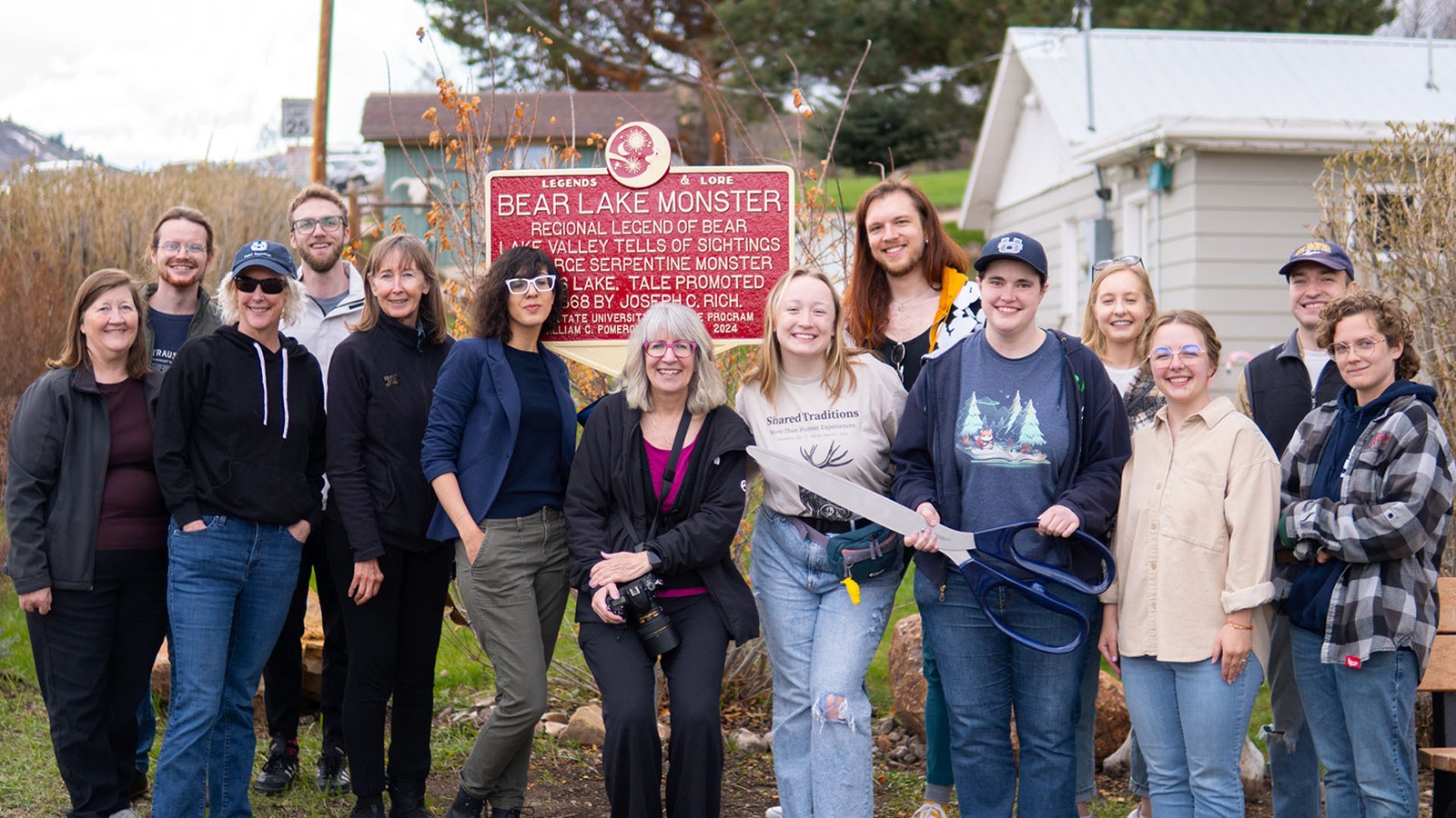 A group of people pose for a photo.