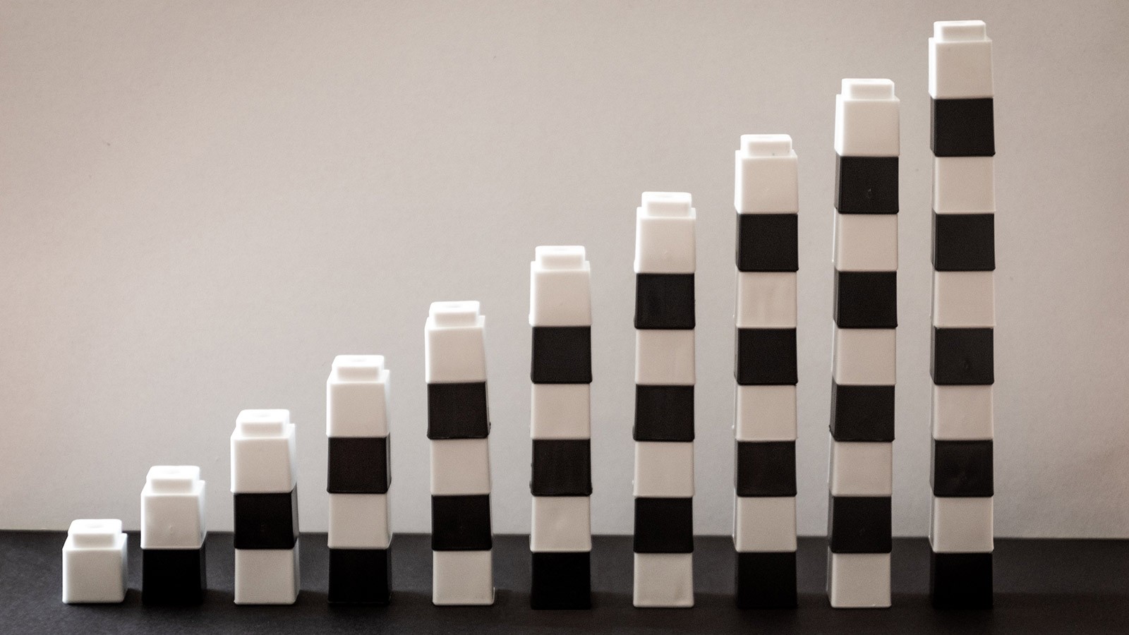 Building blocks stacked in a row.