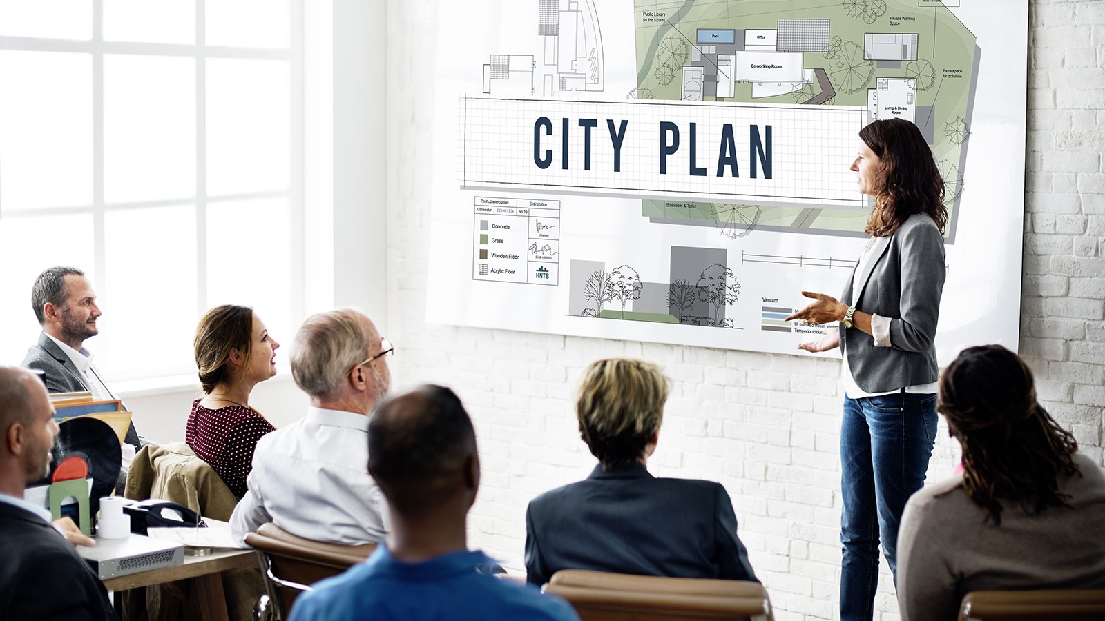 woman giving a city plan presentation.