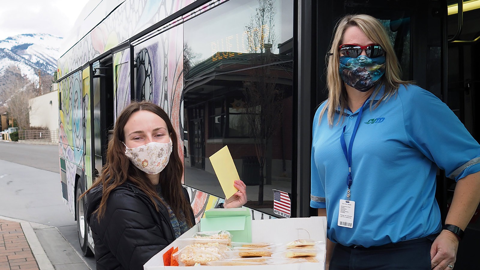 USU student thanking a local bus driver.