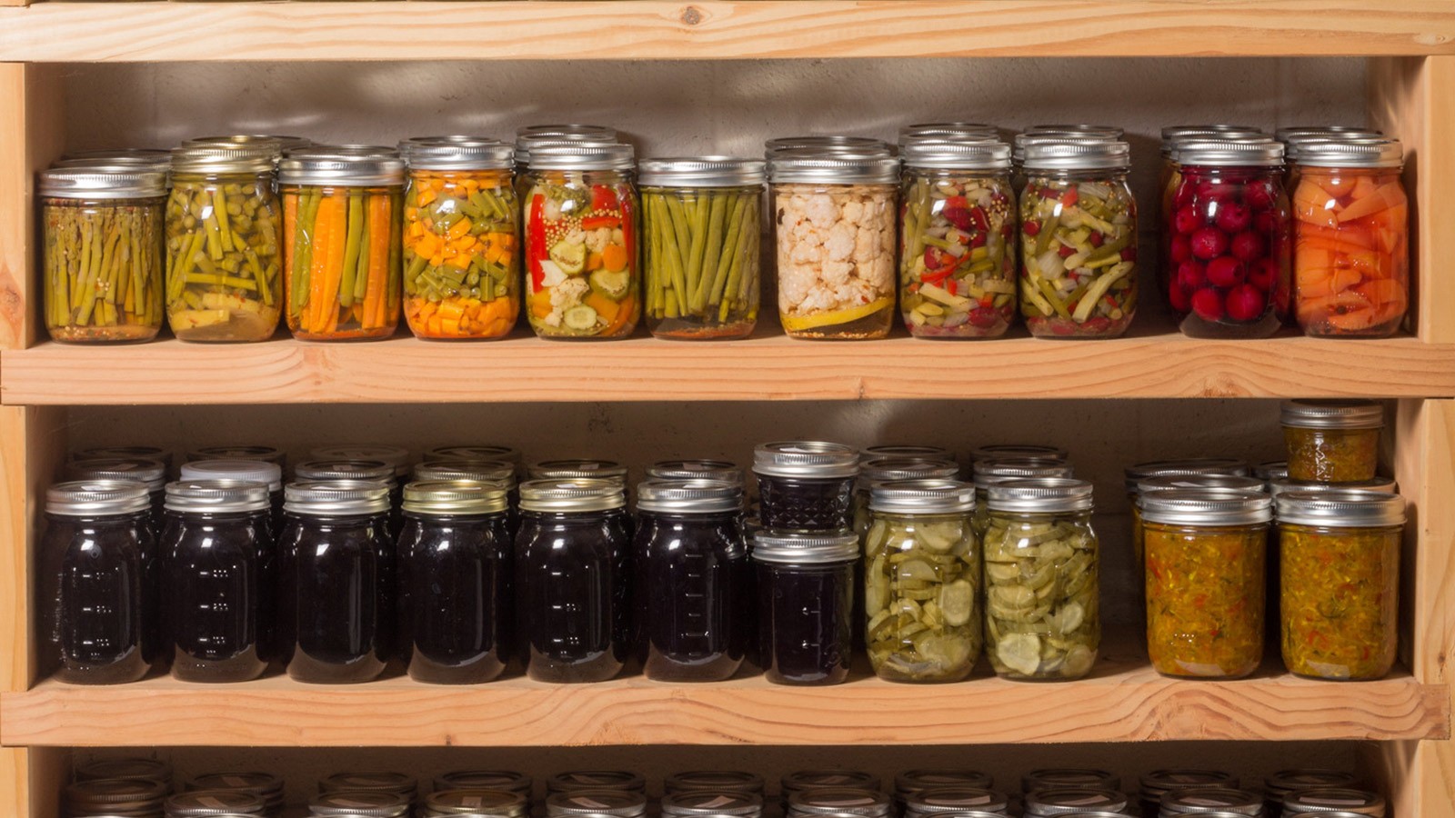 Canned food on a shelf.