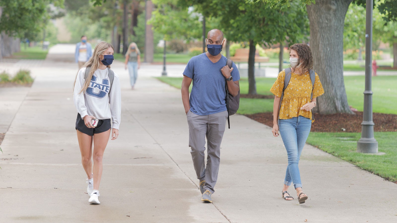 students walking on campus